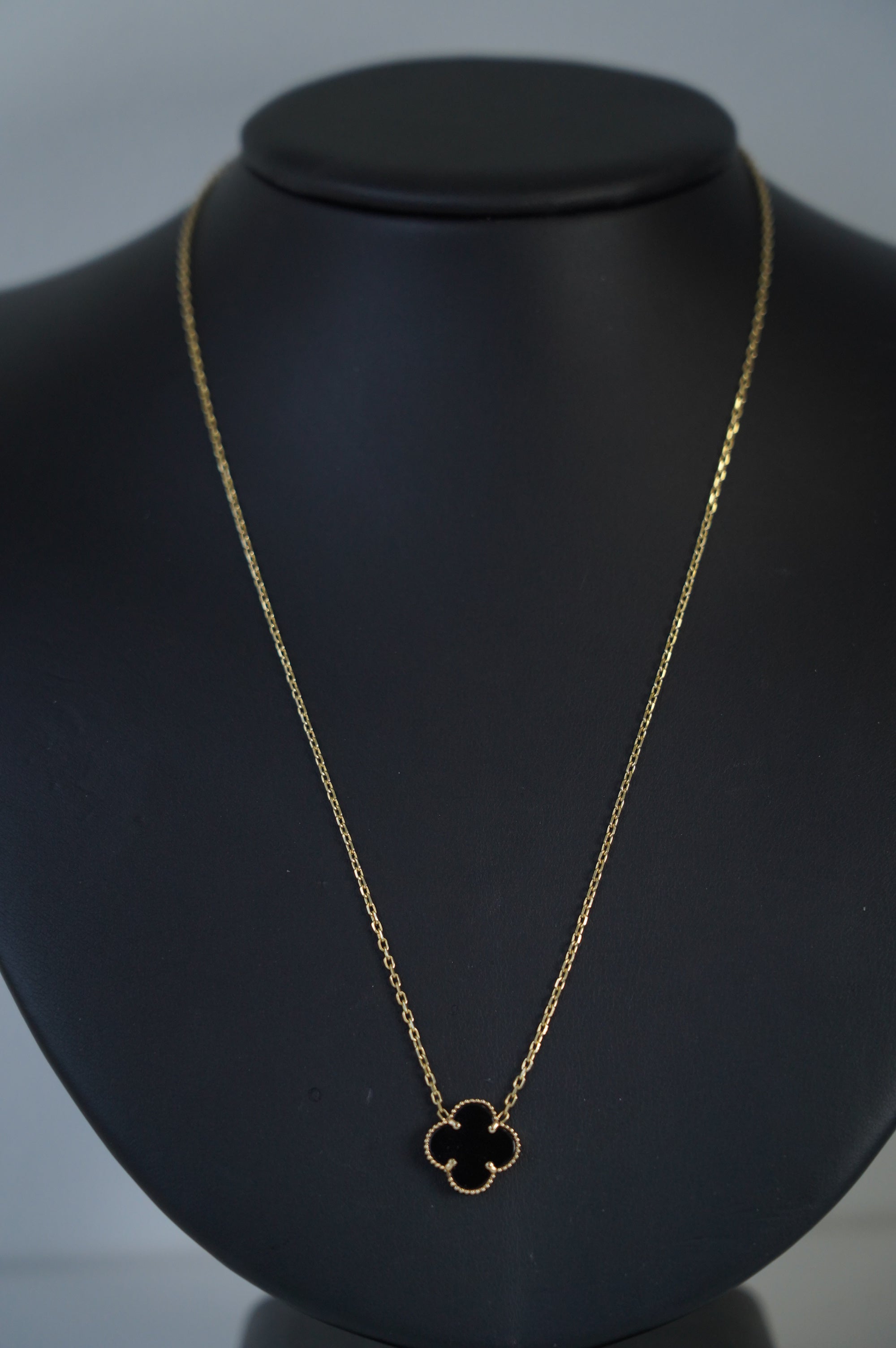 Gold Necklace with Black Four-Leaf Van Cleef Pendant