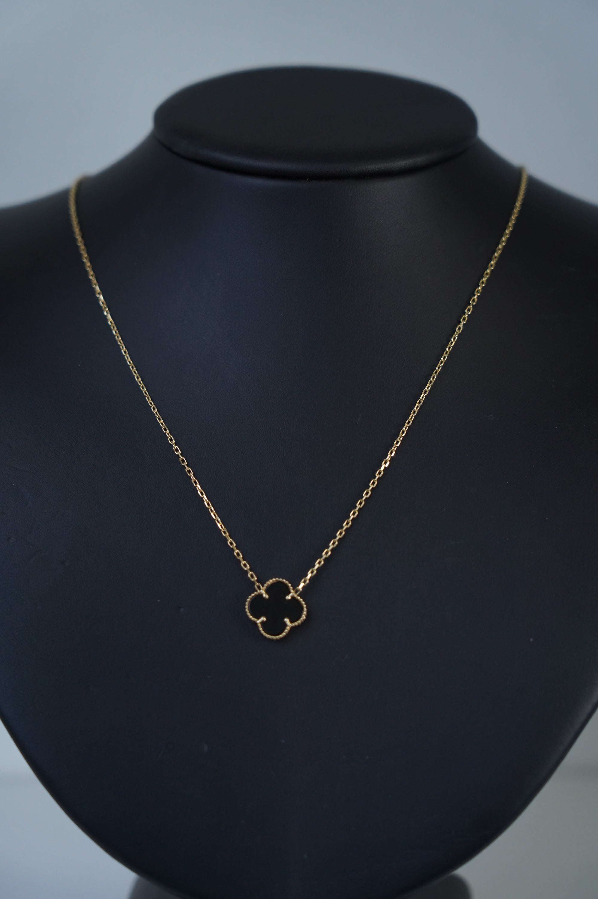 Gold Necklace with Black Van Cleef Pendant