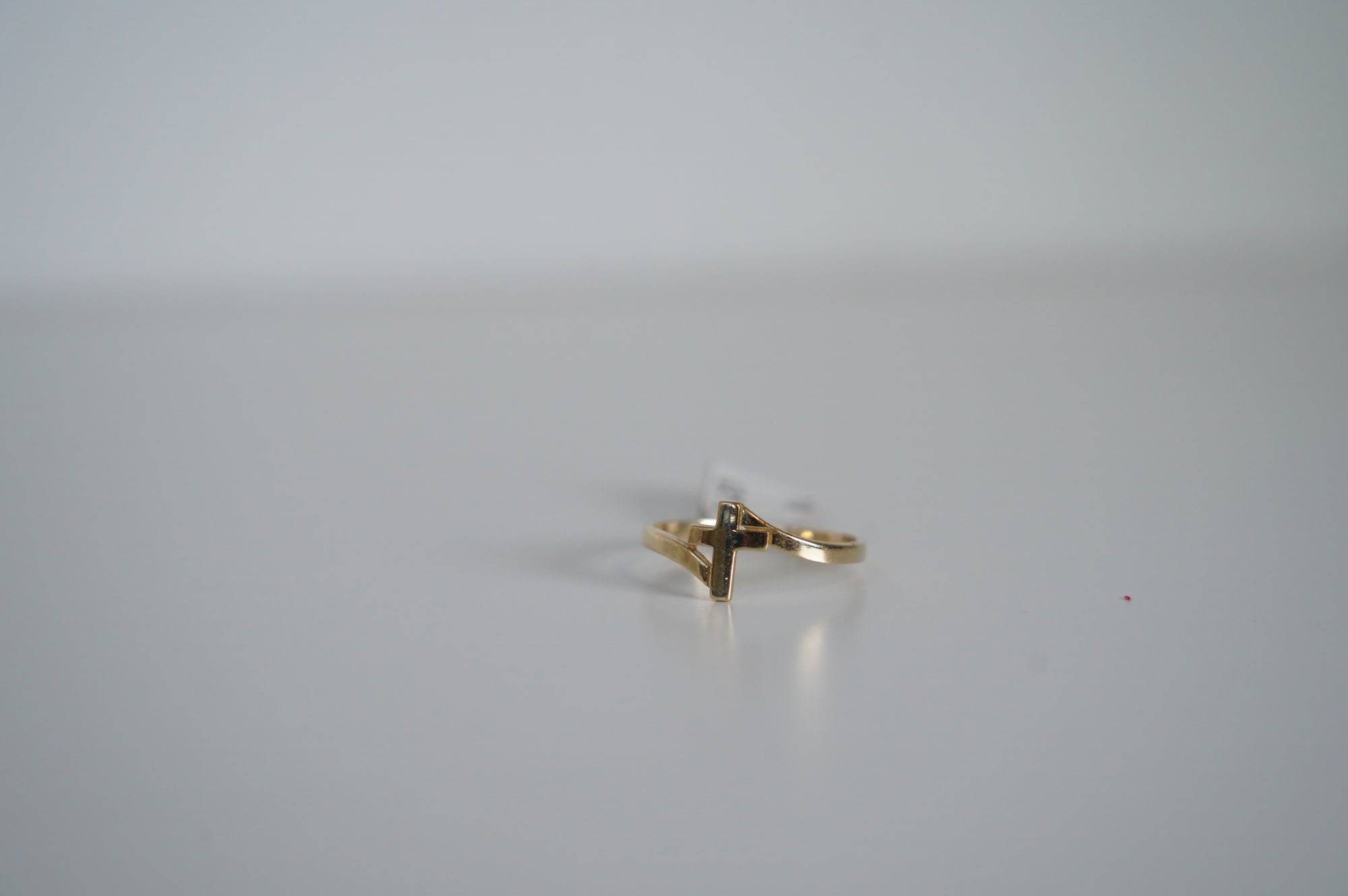 Gold Ring with Cross Design
