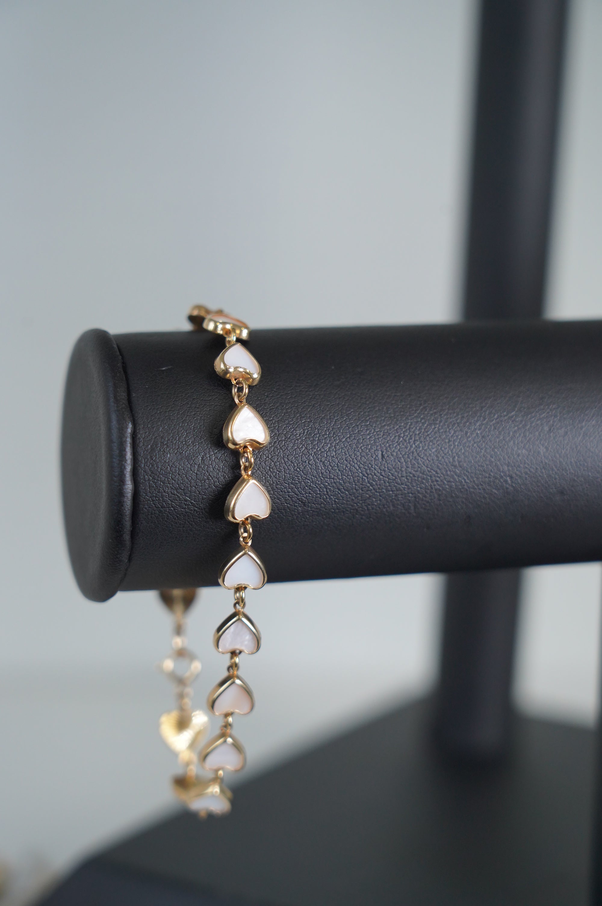 Gold Bracelet with White Enamel Hearts