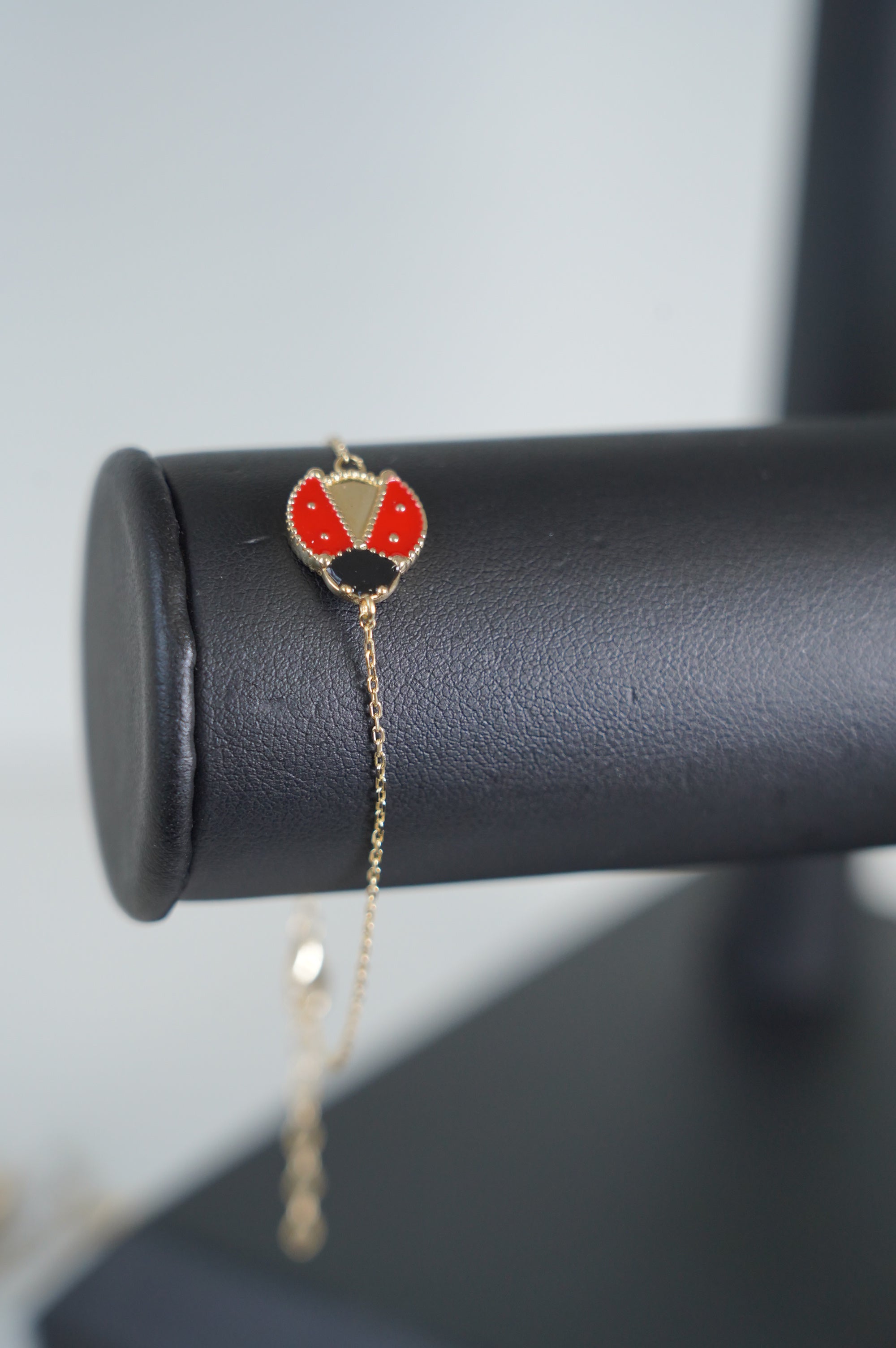 Gold Ladybug Bracelet with Enamel Detail