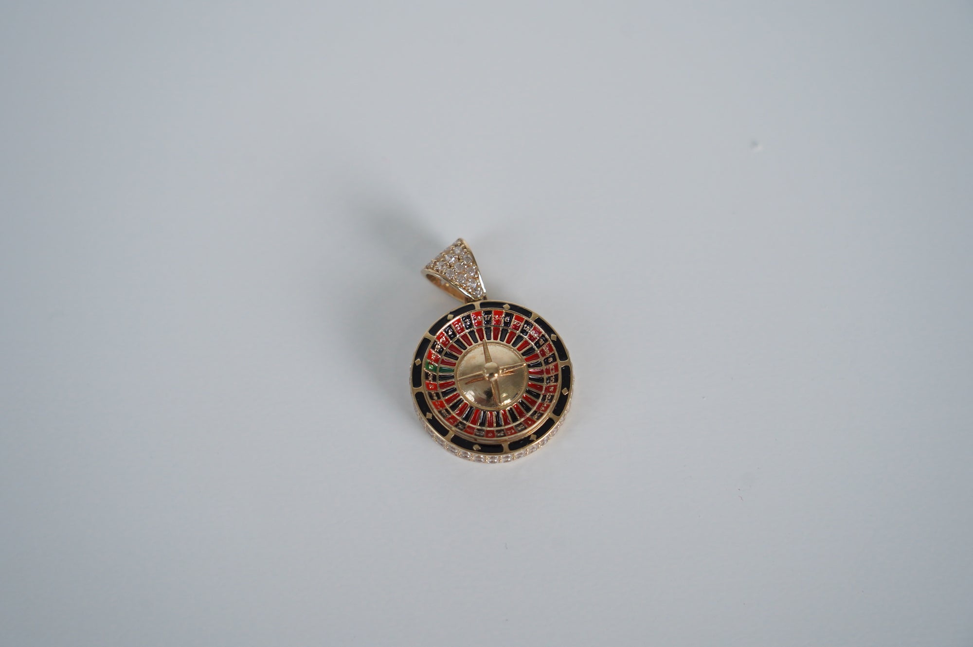 Gold Roulette Wheel Pendant with CZ Stones