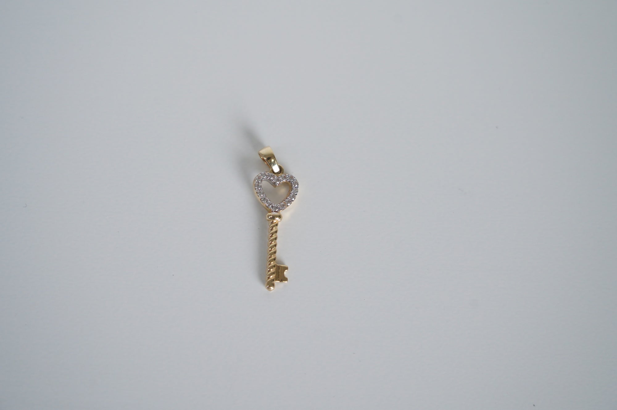 Gold Key Pendant with Heart Design