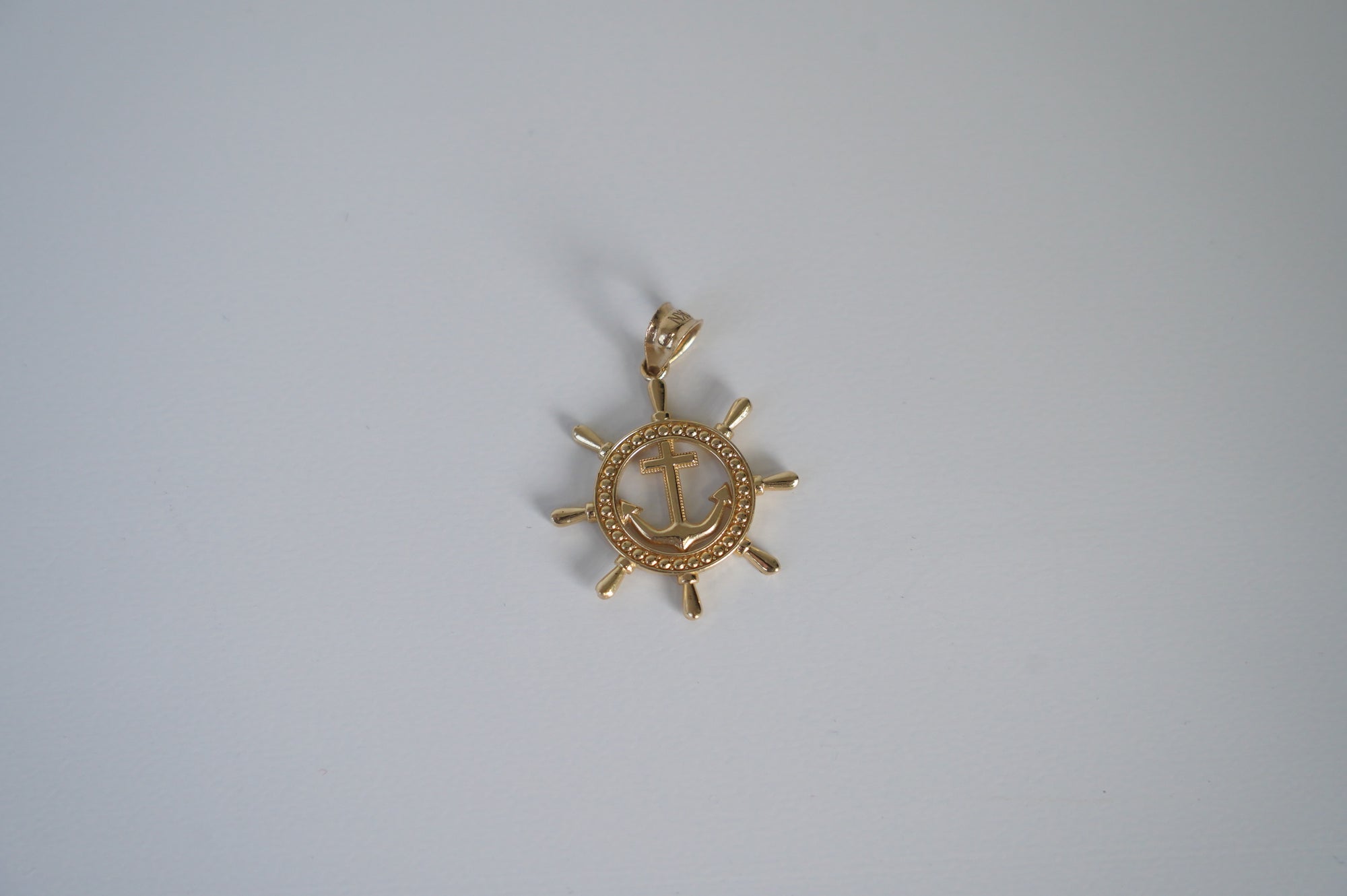 Gold Anchor Wheel Pendant