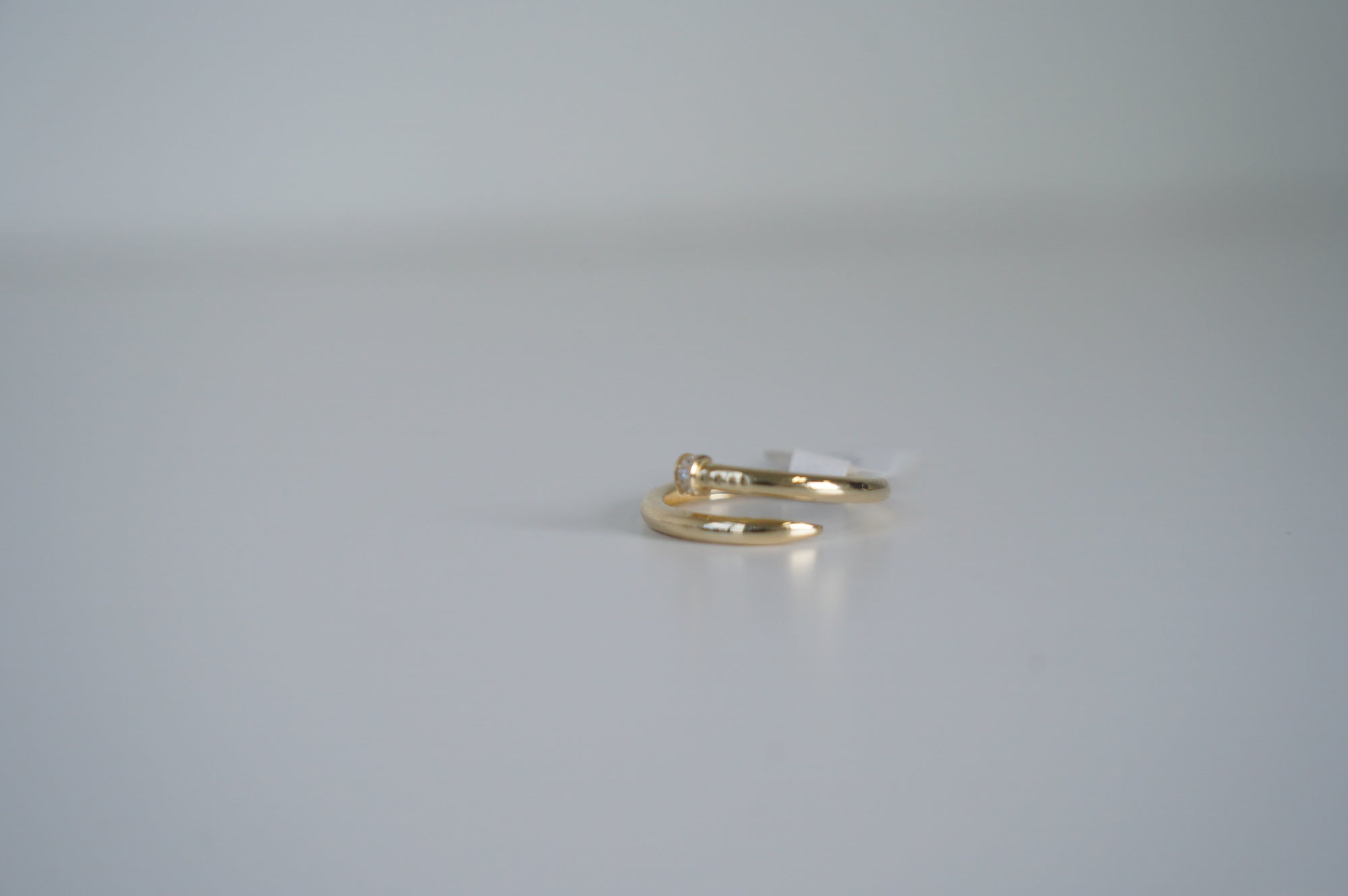 Open Nail-Inspired Ring with Diamond Accent